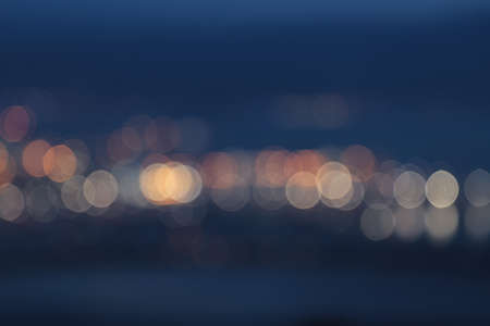Abstract Yellow, Blue and White bokeh texture on Blue background