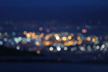Abstract Yellow, Blue and White bokeh texture on Blue backgroundの写真素材
