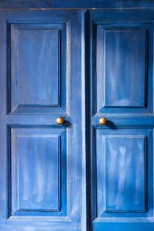 Wooden blue colored door backgroundの写真素材