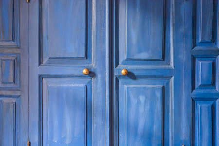 Wooden blue colored door backgroundの写真素材