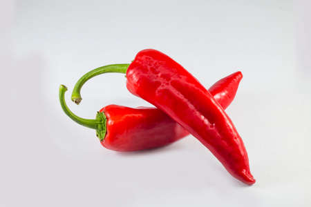 Fresh red pepper, white background