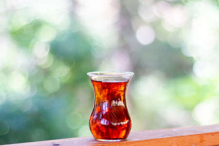 Turkish tea against green natureの写真素材