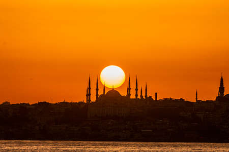 Cityscape of Istanbul with silhouettes of ancient mosques and minarets at sunset. Panoramic view, The Maiden's Tower, Galata Tower, Hagia Sophia, The Blue Mosque and TopkapÄ± Palace in Istanbul.のeditorial素材
