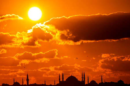 Cityscape of Istanbul with silhouettes of ancient mosques and minarets at sunset. Panoramic view, The Maiden's Tower, Galata Tower, Hagia Sophia, The Blue Mosque and TopkapÄ± Palace in Istanbul.のeditorial素材