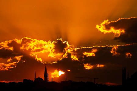 Cityscape of Istanbul with silhouettes of ancient mosques and minarets at sunset. Panoramic view, The Maiden's Tower, Galata Tower, Hagia Sophia, The Blue Mosque and TopkapÄ± Palace in Istanbul.のeditorial素材