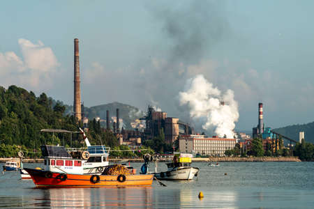 Zonguldak eregli district, fishing boats and erdemir iron and steel factory behind, June 24,2019,...