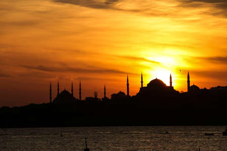 Cityscape of Istanbul with silhouettes of ancient mosques and minarets at sunset. Panoramic view, The Maiden's Tower, Galata Tower, Hagia Sophia, The Blue Mosque and TopkapÄ± Palace in Istanbul.のeditorial素材