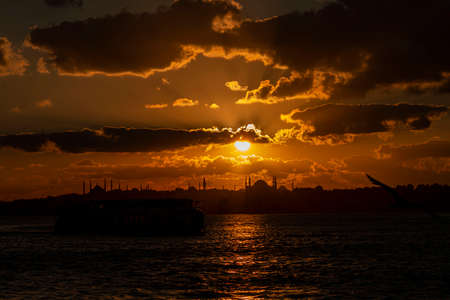 Cityscape of Istanbul with silhouettes of ancient mosques and minarets at sunset. Panoramic view, The Maiden's Tower, Galata Tower, Hagia Sophia, The Blue Mosque and TopkapÄ± Palace in Istanbul.のeditorial素材