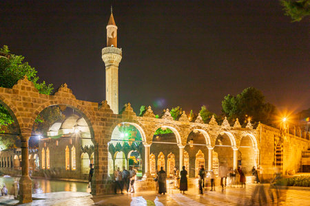 Sanliurfa, Turkey - June 19, 2023 : BalÄ±klÄ±gÃ¶l (BalÄ±k Lake) and Rizvaniye Mosque Landscape in beautiful sunset scenery in ÅanlÄ±urfa, Turkey.のeditorial素材