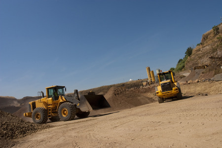 bulldozer in action in a big quarry