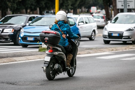 scooter on the city road with helmet4の写真素材