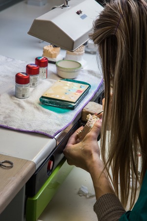 Dental laboratory manufacturing dental prosthesesの写真素材