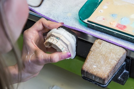 Dental laboratory manufacturing dental prosthesesの写真素材