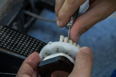 Dental laboratory manufacturing dental prosthesesの写真素材