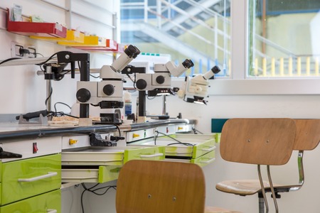 control room with precision optical instruments for the production of dental prosthesesの写真素材
