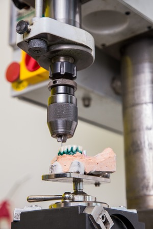 Dental laboratory, manufacturing denture, 
drill in actionの写真素材