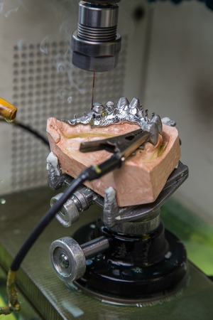 EDM machine for dental prostheses and implants