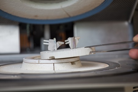 oven and press for ceramic dental prostheses, in actionの写真素材