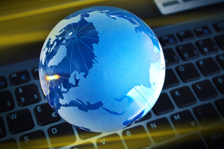 Globe of glass on business statistics