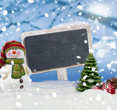 Fir trees and chalkboard snow and snowflakes Merry Christmasの写真素材