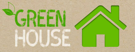 Illustration with house icon and green house on recycled brown paper backgroundの写真素材