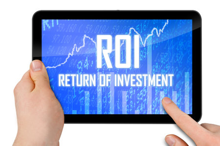 Tablet or laptop with touchscreen and message ROI Return of investment isolated on white backgroundの写真素材
