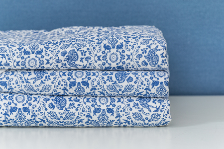 White and blue bedding.