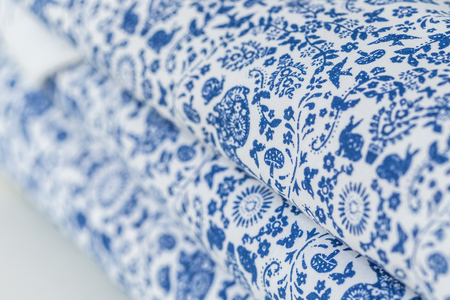 White and blue bedding.の写真素材