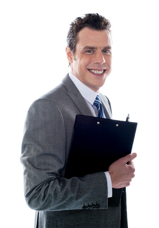 Businessman holding clipboard isolated on white backgroundの写真素材