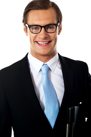Closeup of smiling corporate young man isolated against white backgroundの写真素材