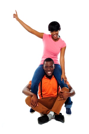 Couple having fun. Studio shot. All on white backgroundの写真素材