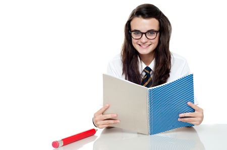 Intelligent student preparing for test, read notesの写真素材