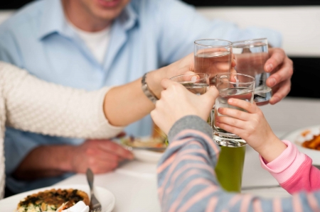 It's time to celebrate. Family toasting.