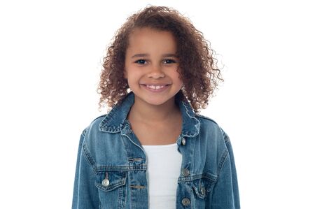 Casual young little smiling girlの写真素材