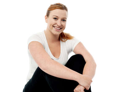 Studio shot of an isolated charming young girlの写真素材