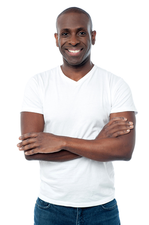 Casually dressed middle aged man with arms foldedの写真素材