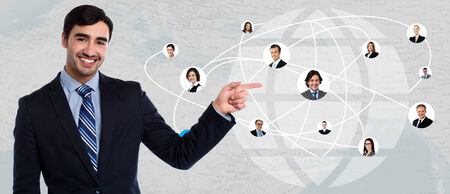 Businessman showing his connected friends in worldwideの写真素材