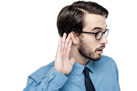 Businessman carefully listening to conversation