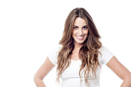 Pretty woman with hands on her waistの写真素材