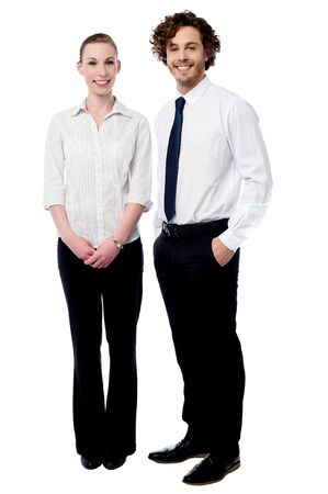 Full length of business couple posing togetherの写真素材