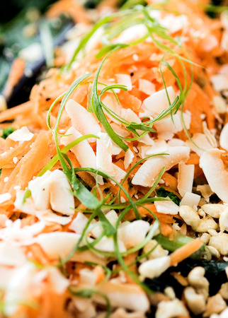 Close up of salad of carrots and cashew nutsの写真素材