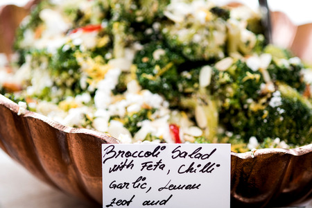 Broccoli salad with feta is displayed to serveの写真素材