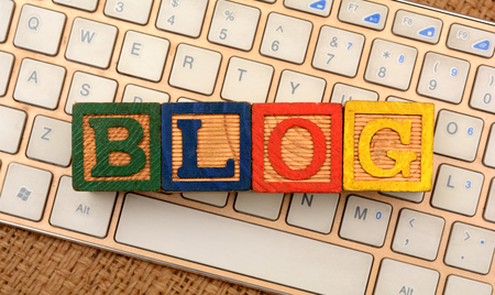 Blog words on laptop keyboard top viewの写真素材