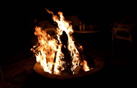 Bonefire hot red charcoals on black background