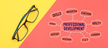 Professional Development Chart Drawing with eyeglass.の写真素材