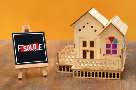 House 3D miniature with Sold chalkboard sign.の写真素材