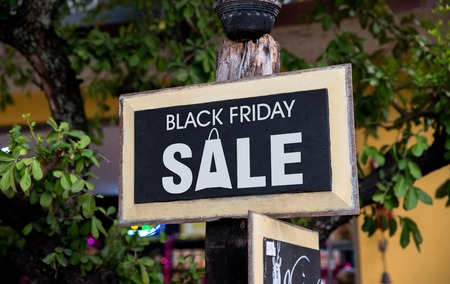 Black Friday Sale Sign on wooden sign boardの写真素材