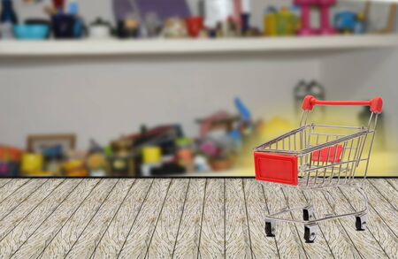 Shopping cart  ,   with blur market backgroundの写真素材