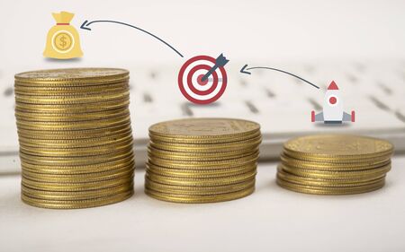 Growth icons on coin stack, future planning, business development conceptの写真素材