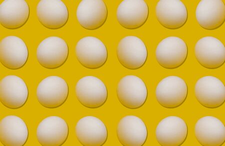 Egg seamless pattern on yellow background, food conceptの写真素材